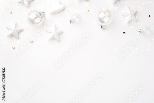 Obraz Festive Christmas ornaments on a white background.