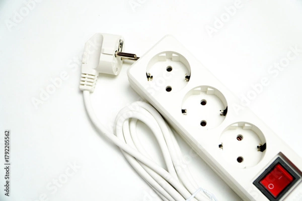 Fototapeta Power Strip with Switch: Multi-Socket Outlet for Electrical Appliances. White 4 hole socket ( stop contact) with brown wood background. Close-up of Electrical Cables with Exposed Copper Wires on White
