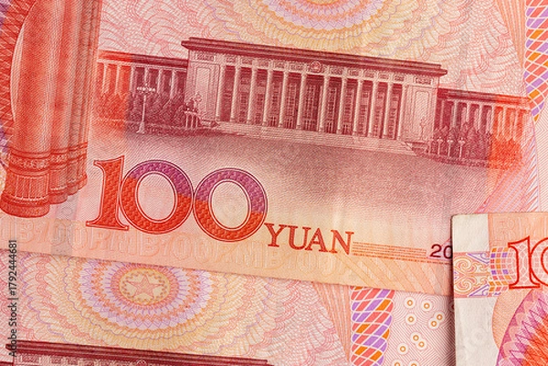 Fototapeta red currency of one hundred yuan used in the China close up, details of different elements of the red banknote 100 yuan