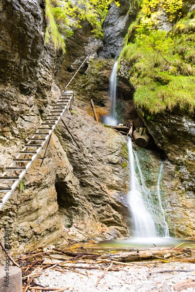 Fototapeta Sucha Bela gorge in Slovensky raj National park, Slovakia. Hikiing Path. Sucha Bela gorge is most popular and one of the most attractive trails. Picture shows Misove vodopady waterfall.