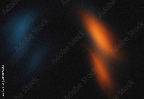Obraz Abstract neon light streaks in blue and orange across a dark textured background, capturing dynamic motion and futuristic energy for design, branding, and technology visuals