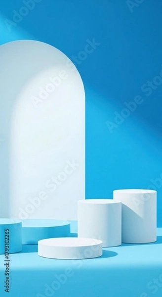 Obraz Minimalist blue and white podiums with arched backdrop and soft shadows