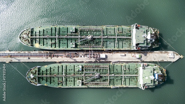 Obraz Aerial shot of two tanker ships anchored at the oil terminal at port