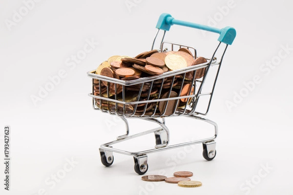 Obraz The Value of Spare Change: Miniature Shopping Cart Full of Mixed Euro Coins on a Bright White Background