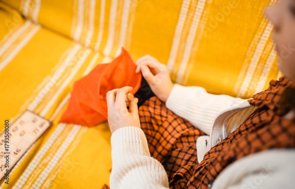 Fototapeta Happy father and child playing board game at home - happiness and family concept.