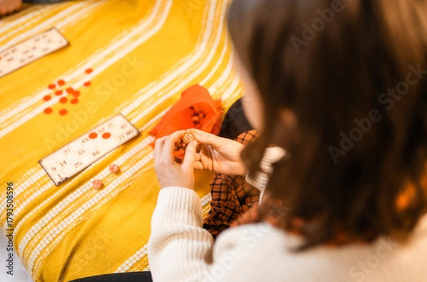Fototapeta Happy father and child playing board game at home - happiness and family concept.