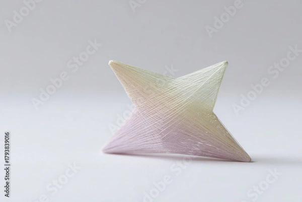 Fototapeta fantastical star made of colorful threads positioned against clean pastelcolored canvas