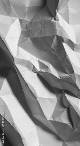 Fototapeta Close-up abstract background showing deeply crumpled white paper with harsh shadows, resulting in a complex, chaotic, and rough pattern ,complex ,texture ,structure