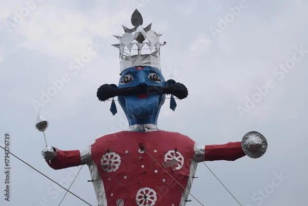 Fototapeta Ravnans being ignited during Dussehra festival at ramleela ground in Delhi, India, Big statue of Ravana to get fire during the Fair of Dussera to celebrate the victory of truth by Lord Rama