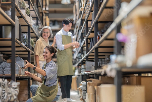 Fototapeta Mother and Family Business Owner Teaching About Material Production and Recycling