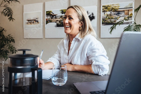 Obraz Professional woman working in an architecture studio with modern decor