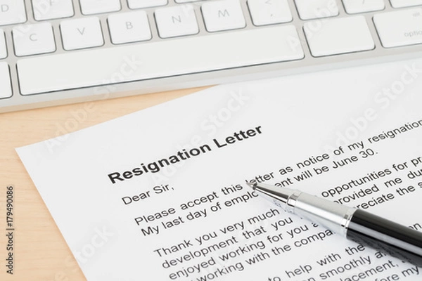 Obraz Resignation letter resign with pen and keyboard