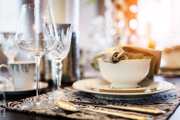 Fototapeta dining set with dish and spoon on white clean napkin