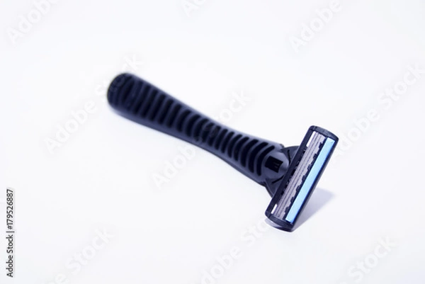 Obraz Shaving Razor Over White Background
