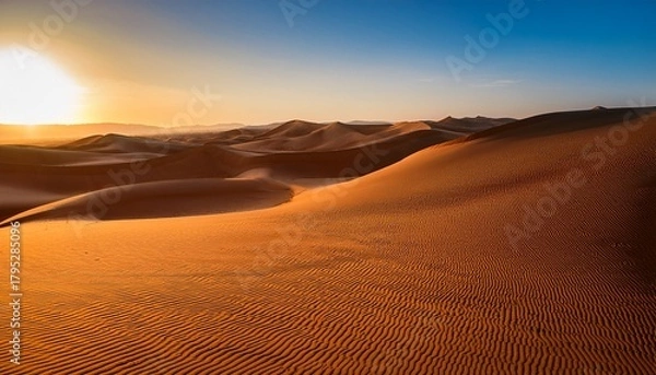 Fototapeta desert dunes at sunrise golden light smooth sand textures minimalistic wide view