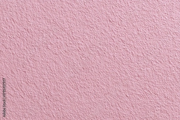 Fototapeta Subtle textured pink fabric background with a soft and delicate appearance