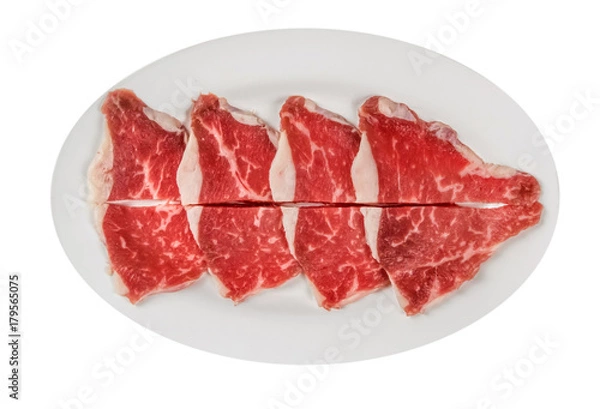 Obraz raw beef fillets on a plate .