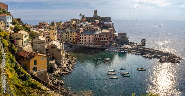 Obraz High panoramic view of Vernazza from the trail to Monterosso al Mare, showing the entire village perched on the rocks and the horseshoe-shaped harbor. Cinque Terre, Italy