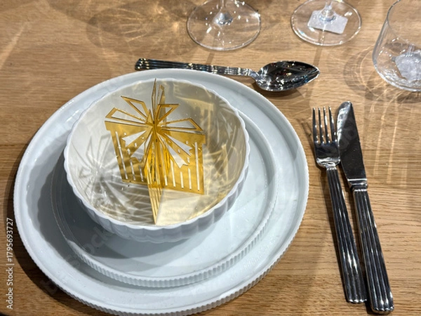 Obraz Holiday dining setup with plates and cutlery