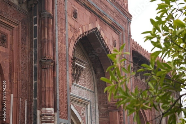 Fototapeta Tall Mughal Doorway with Arched Frame in Red Sandstone Walls