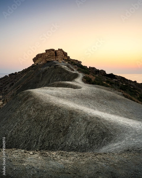 Obraz Path leading to a serene sunset view near ancient ruins in a rocky landscape