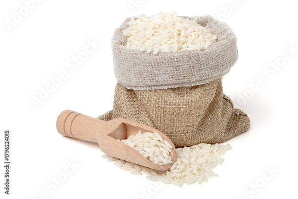 Fototapeta Sticky rice in a jute sack with a wooden spoon to scoop it up. isolated on white background.