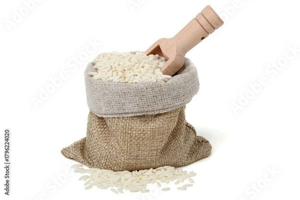 Fototapeta Sticky rice in a jute sack with a wooden spoon to scoop it up. isolated on white background.
