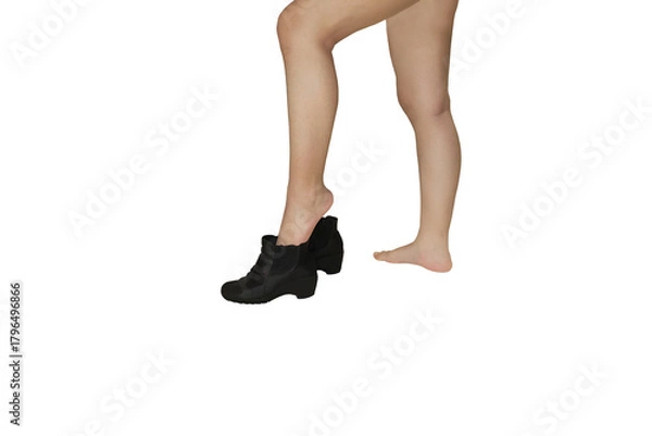 Fototapeta Close up of a woman's leg lifted up to put on women's ankle boots isolated on transparent background png file.