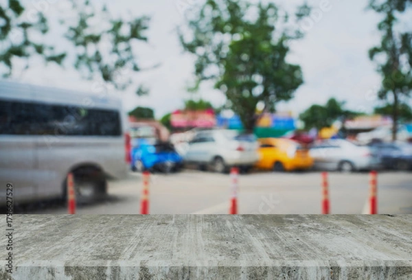 Obraz View from inside the coffee shop. Concrete Counter. Glass backdrop with raindrops stuck on the glass.