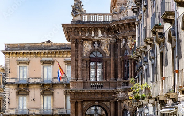 Obraz Examples of the grand baroque architecture of Catania, Sicily, featuring a side view of the Teatro Massimo Bellini. Named after the composer Vincenzo Bellini, it was inaugurated on 31 May 1890.