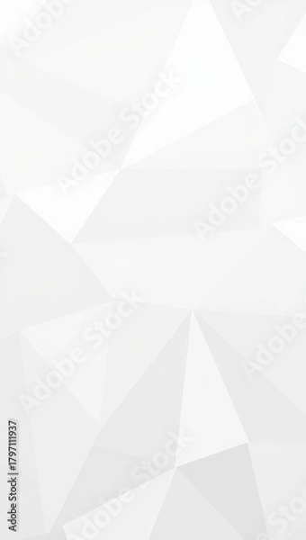 Fototapeta A minimalist geometric background featuring a pattern of soft, overlapping white and light gray triangles, creating a subtle 3D effect with clean, modern lines.