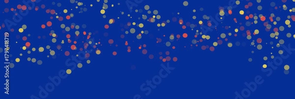Fototapeta Colorful blurred Christmas bokeh lights on blue background festive overlay design.