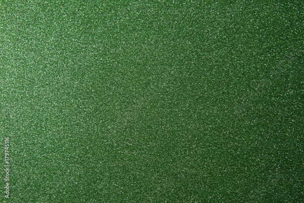 Fototapeta texture of green glitter paper background for design Christmas or New Year's cards