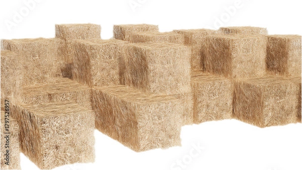 Obraz Numerous rectangular bales of dried hay or straw stacked in an irregular pattern against a white background.