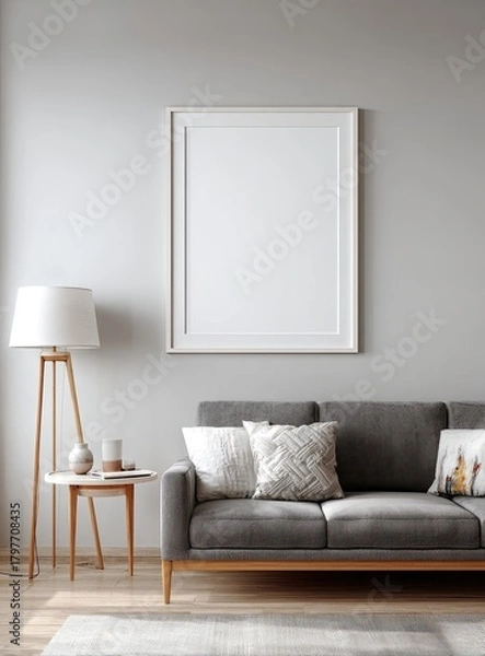 Obraz Interior scene of a modern living room with a blank framed art hanging above a gray couch