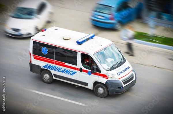 Obraz Ambulance van on highway