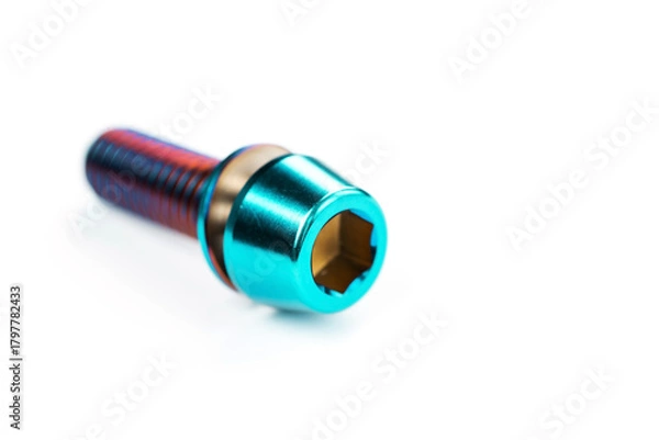 Obraz Lightweight and durable titanium bolt on a clean insulated background.