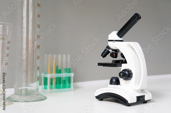 Fototapeta microscope with test tubes and samples in the laboratory