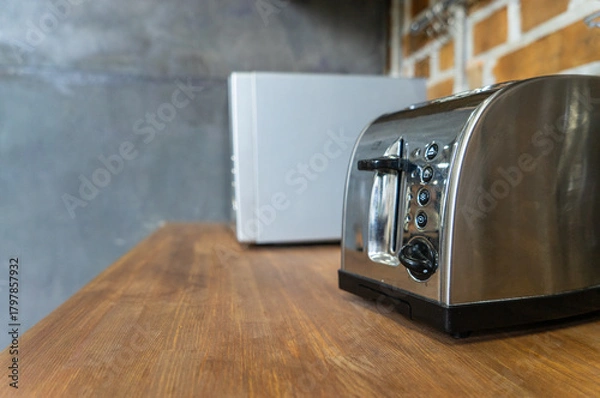 Obraz toaster on the table in the kitchen