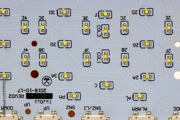 Fototapeta LED light module board, electronic circuit panel with surface mount diodes on gray PCB. 
