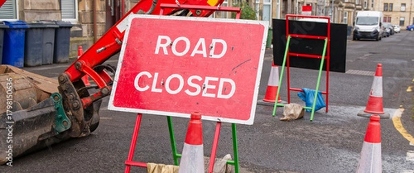 Fototapeta Road closed sign due to works in progress