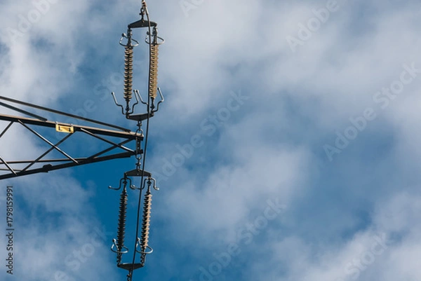Fototapeta High Voltage Power Line Insulators Against Sky
