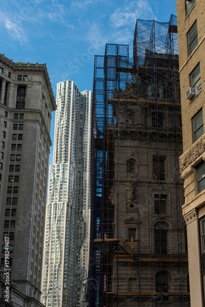 Fototapeta Skyscraper under renovation