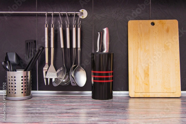 Obraz Black kitchen with kitchen utensils