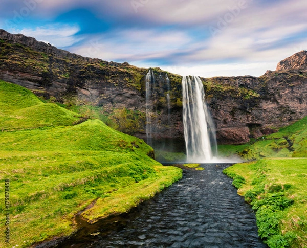 Fototapeta Morning view of Seljalandfoss Waterfall on Seljalandsa river in summer.