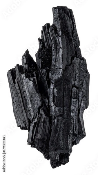 Fototapeta Close-up view of a chunk of irregular, jagged charcoal against a stark white background