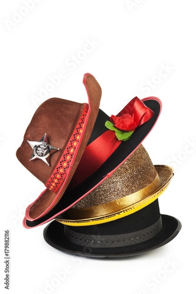 Fototapeta stack of different hats isolated