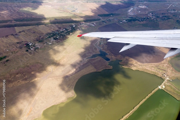 Obraz View out of plane window