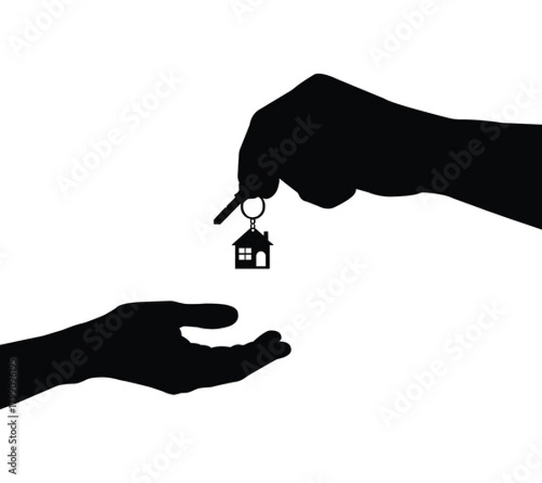 Obraz Hand holding a key symbolizing real estate and security.