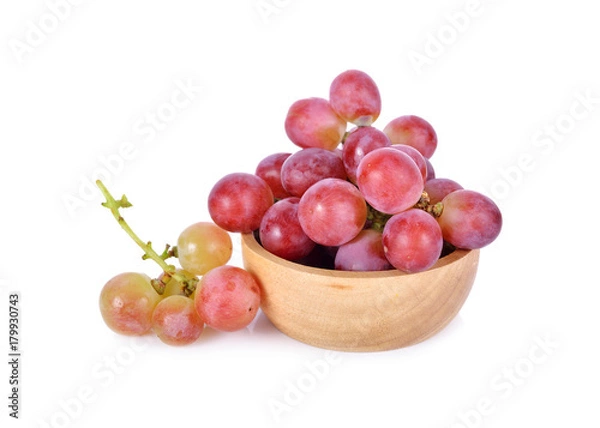 Obraz fresh grapes in wooden bowl and on white background